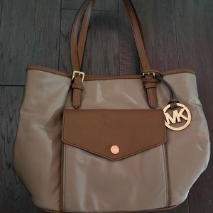 Michael Kors tan purse.